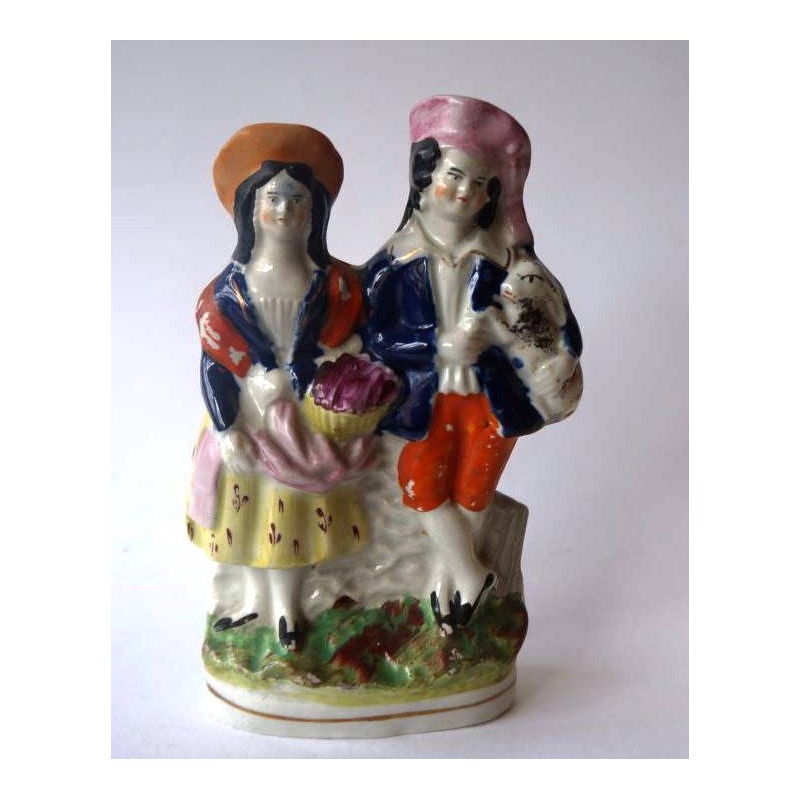 Staffordshire Pottery Boy and Girl