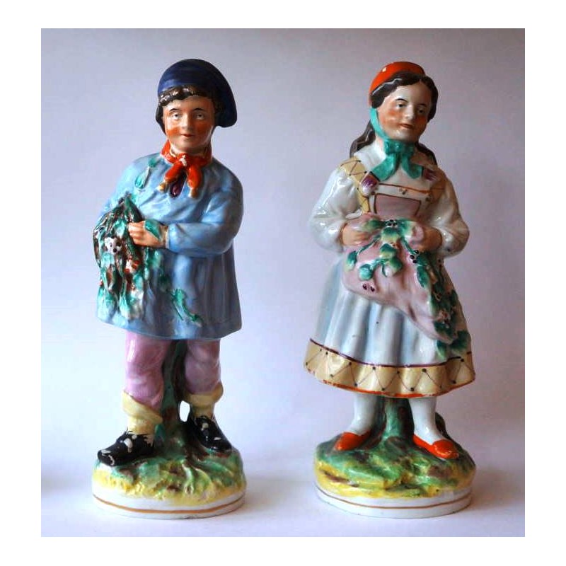 Staffordshire Pottery Boy and Girl pair