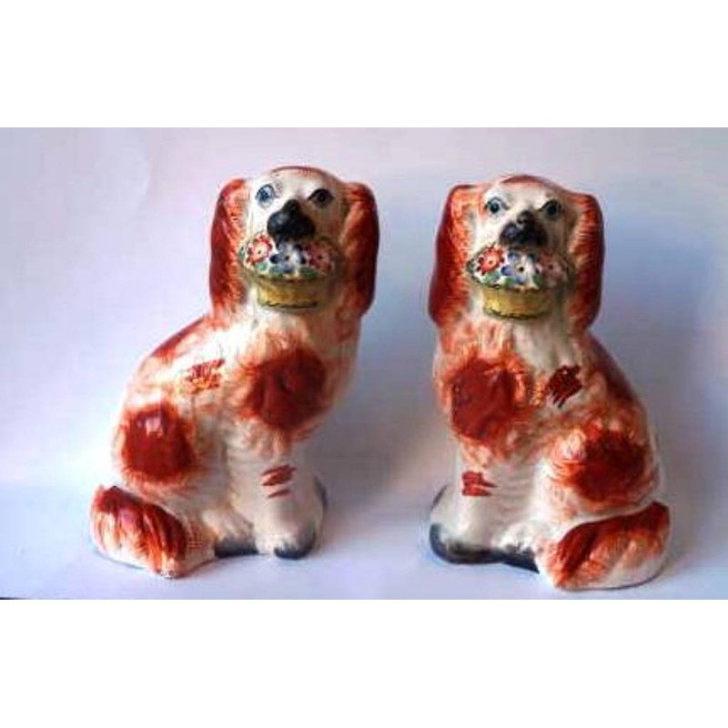 Staffordshire Pottery pair Spaniels with flower baskets