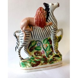Staffordshire Pottery Zebra with lion