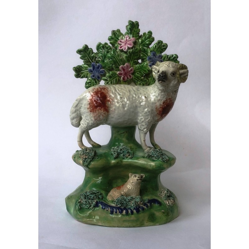 Staffordshire Pottery Ram standing above a Lamb