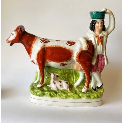 Staffordshire Pottery Red patch cow and attendant