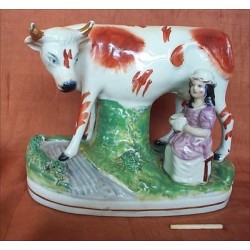 Cow with Milk Maid