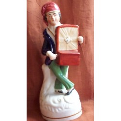 Staffordshire figure of Hurdy Girdy Player