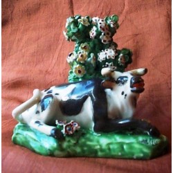 Recumbant Porcelain Cow