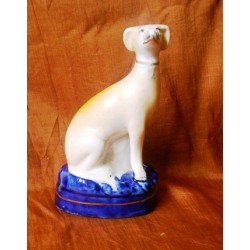 Seated small Greyhound