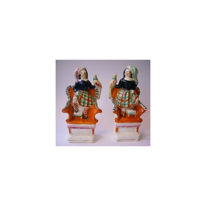 Staffordshire Pottery children with exotic birds.Pair