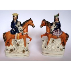 Equestrian boy and girl with Spaniels. Pair