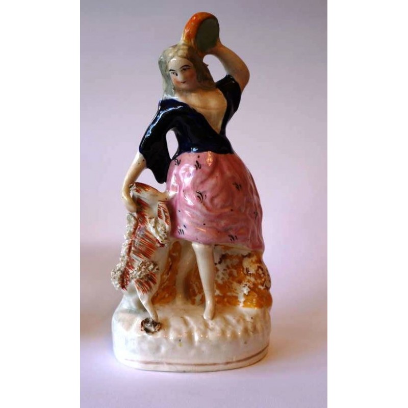 Staffordshire figure of Esmeralda with goat