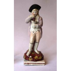 Staffordshire figure of Autumn